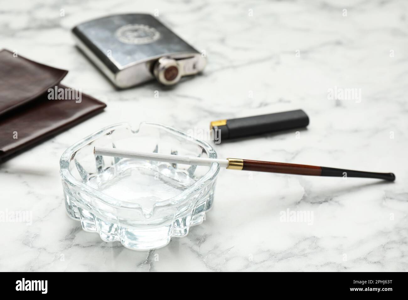 Glass ashtray with long cigarettes holder, clutch, pocket flask and