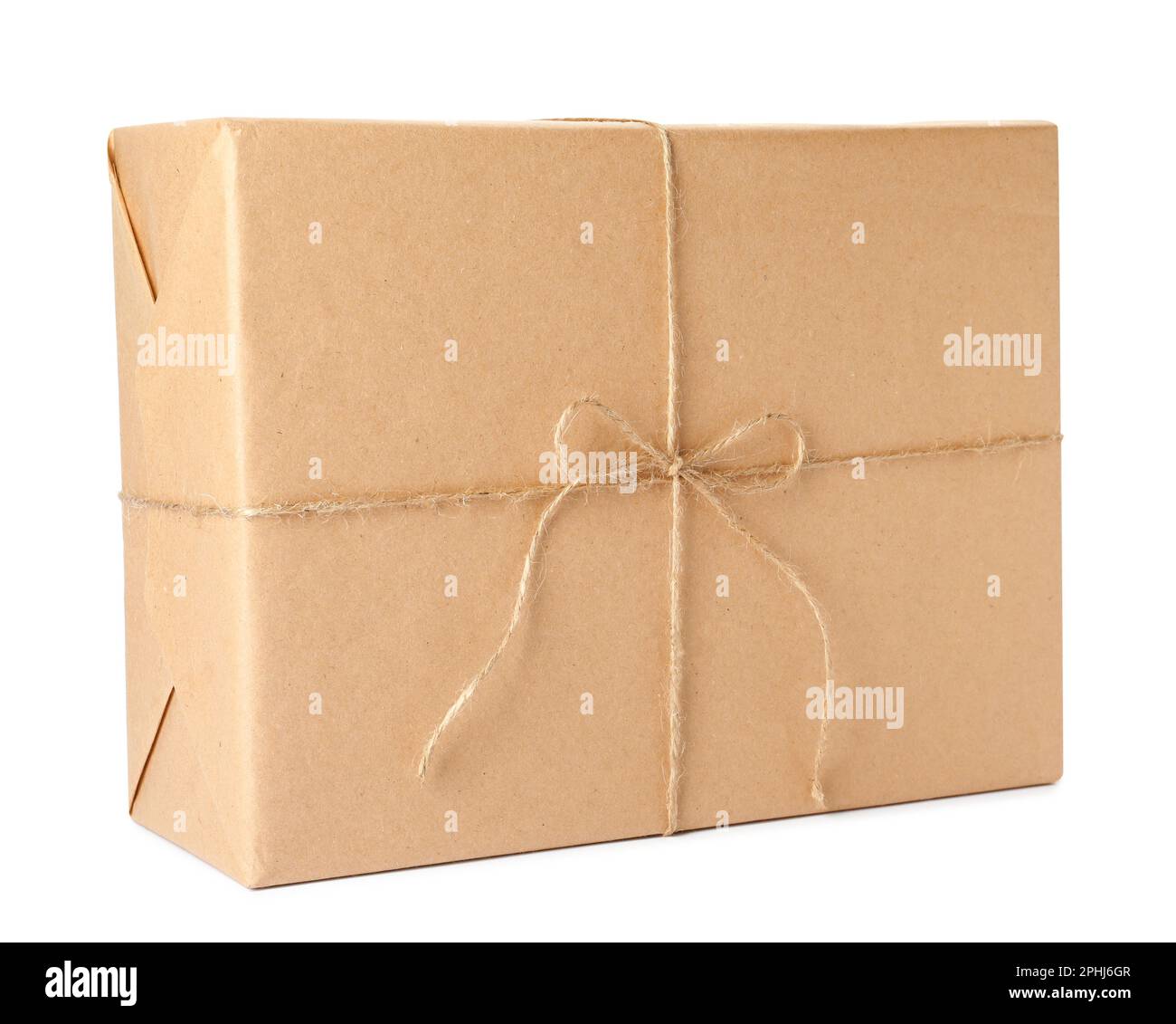 Parcel wrapped with kraft paper and twine isolated on white Stock Photo ...