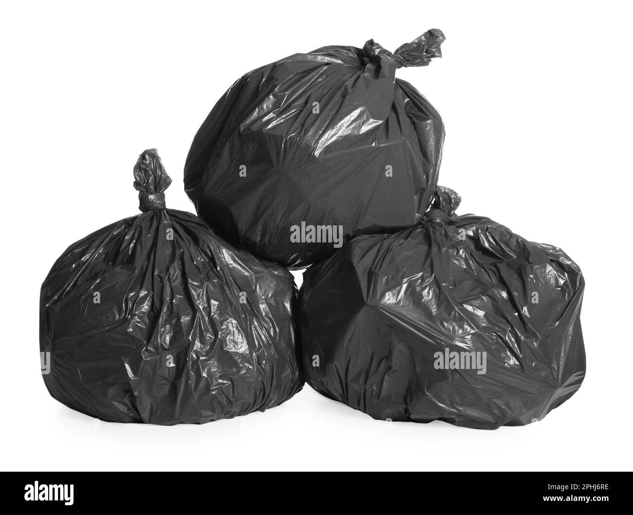 Black plastic bags filled with garbage Cut Out Stock Images & Pictures