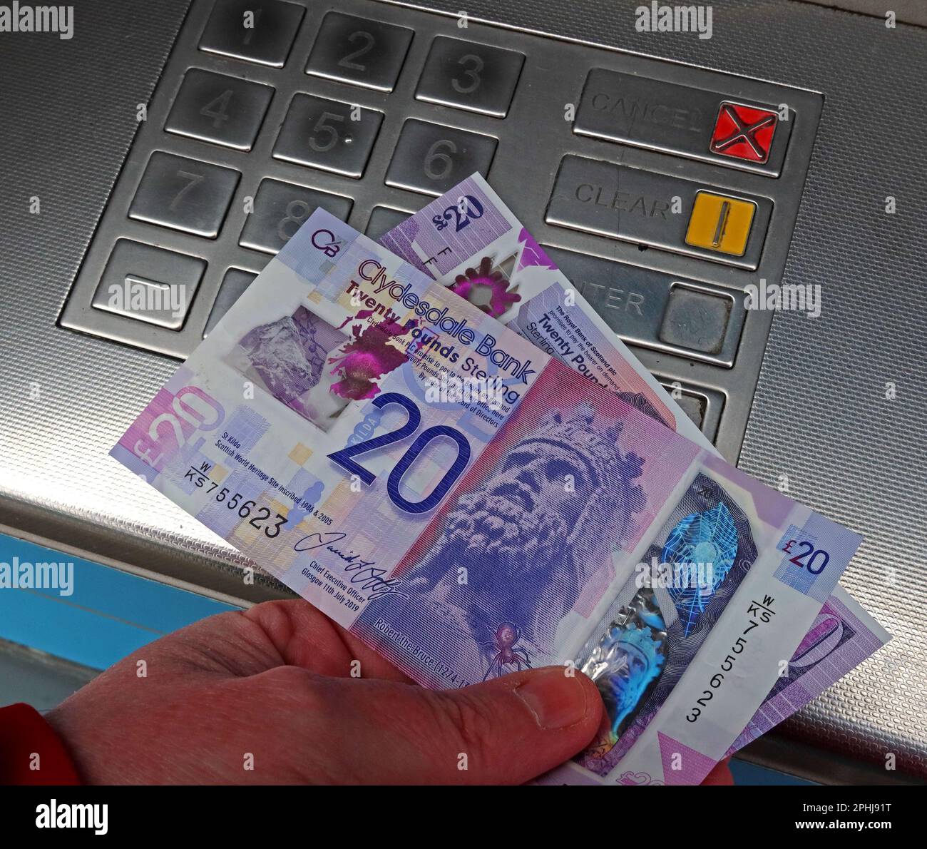 Cash point - Scottish bank notes, dispensed from a local ATM, Automatic Teller cash machine, Glasgow, Scotland, UK, G3 8AD Stock Photo