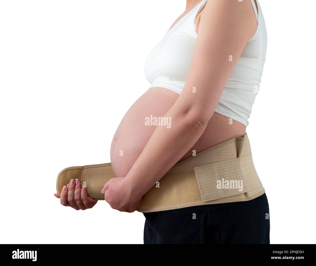 Pregnant woman putting on supporting bandage to reduce backache