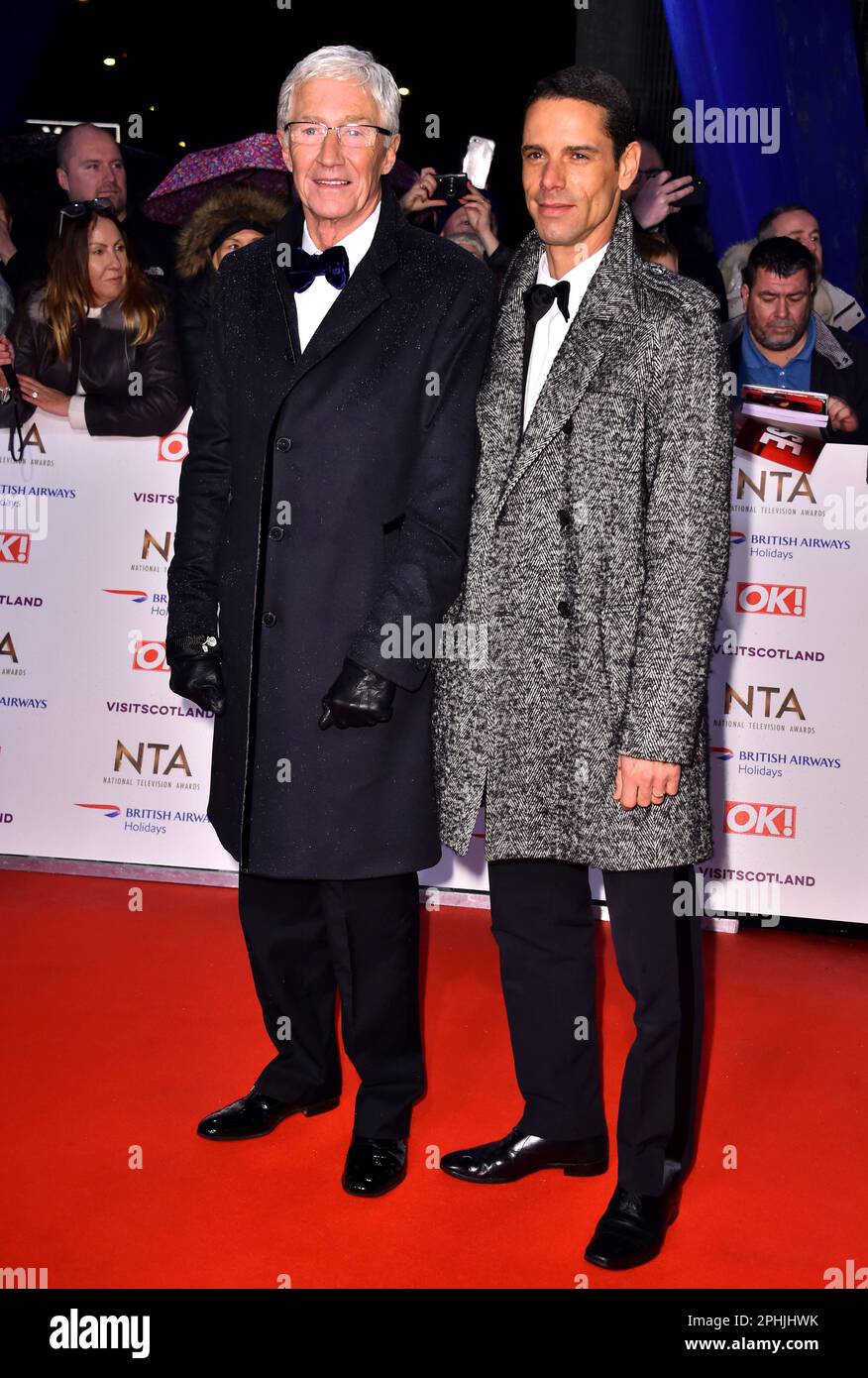 File photo dated 22/01/19 of Paul O'Grady and Andre Portasio attending the National Television Awards 2019 held at the O2 Arena, London. TV presenter and comedian Paul O'Grady has died at the age of 67, his partner Andre Portasio has said. The TV star, also known for his drag queen persona Lily Savage, died 'unexpectedly but peacefully' on Tuesday evening, a statement shared with the PA news agency via a representative said. Issue date: Wednesday March 29, 2023. Stock Photo