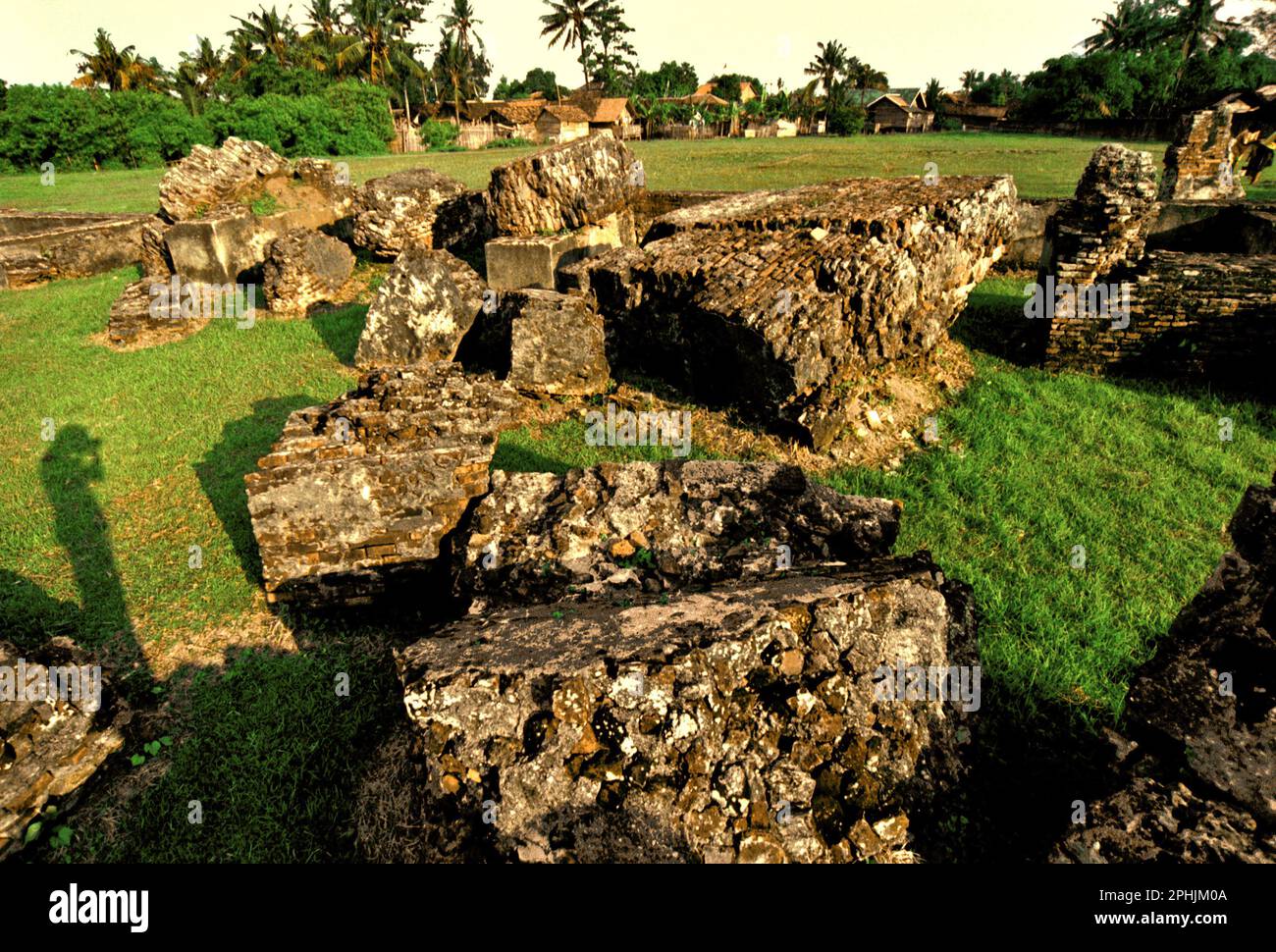 Ruins at Kaibon palace, one of the cultural heritage objects from Banten Sultanate period located in area now called Banten Lama (Old Banten) in Serang, Banten, Indonesia. 'The sustainability of cultural heritage is strongly linked to the effective participation of local communities in the conservation and management of these resources,' according to a team of scientists led by Sunday Oladipo Oladeji in their research article published on Sage Journals on October 28, 2022. Banten Lama (Old Banten) area was a part of the important port of Banten Sultanate, especially during the reign of... Stock Photo