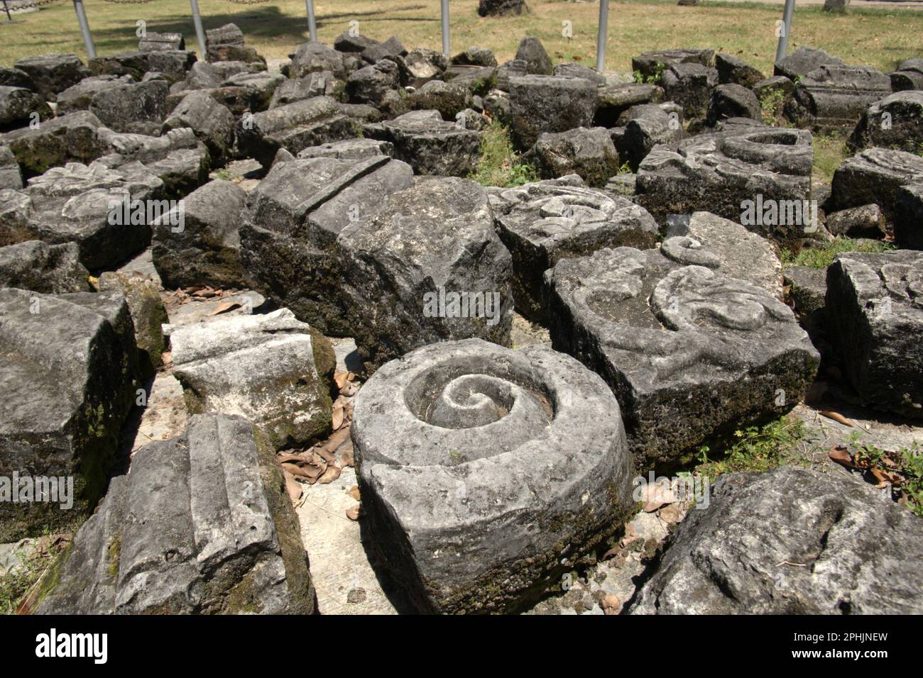 Pieces of stonecrafts in area now called Banten Lama (Old Banten) in Serang, Banten, Indonesia. 'The sustainability of cultural heritage is strongly linked to the effective participation of local communities in the conservation and management of these resources,' according to a team of scientists led by Sunday Oladipo Oladeji in their research article published on Sage Journals on October 28, 2022. Banten Lama (Old Banten) area was a part of the important port of Banten Sultanate, especially during the reign of Sultan Ageng Tirtayasa (1651-1683). Stock Photo