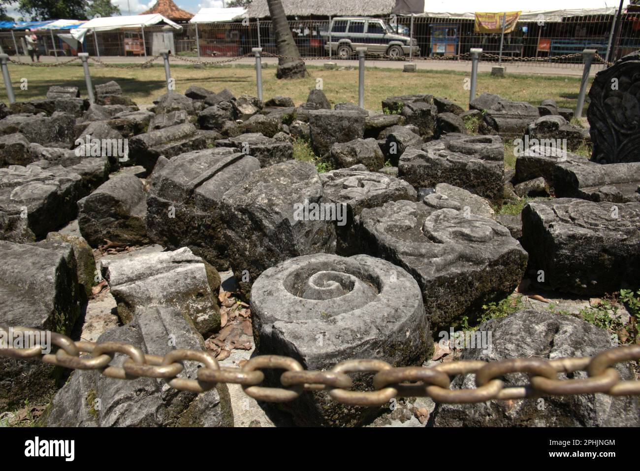 Pieces of stonecrafts in area now called Banten Lama (Old Banten) in Serang, Banten, Indonesia. 'The sustainability of cultural heritage is strongly linked to the effective participation of local communities in the conservation and management of these resources,' according to a team of scientists led by Sunday Oladipo Oladeji in their research article published on Sage Journals on October 28, 2022. Banten Lama (Old Banten) area was a part of the important port of Banten Sultanate, especially during the reign of Sultan Ageng Tirtayasa (1651-1683). Stock Photo