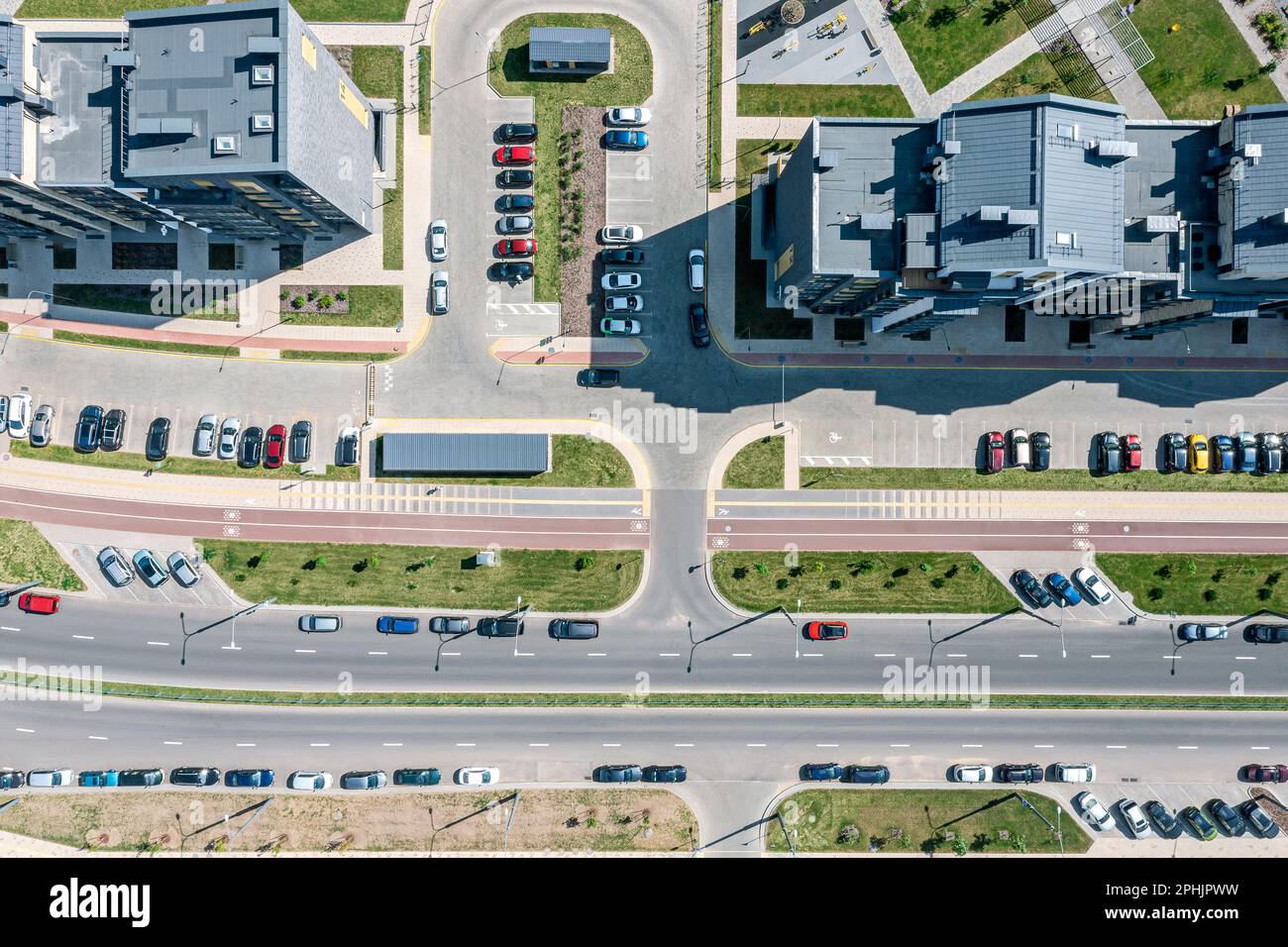 top view of urban streets, road intersections, parking lots and buildings. city transport. aerial collection. Stock Photo
