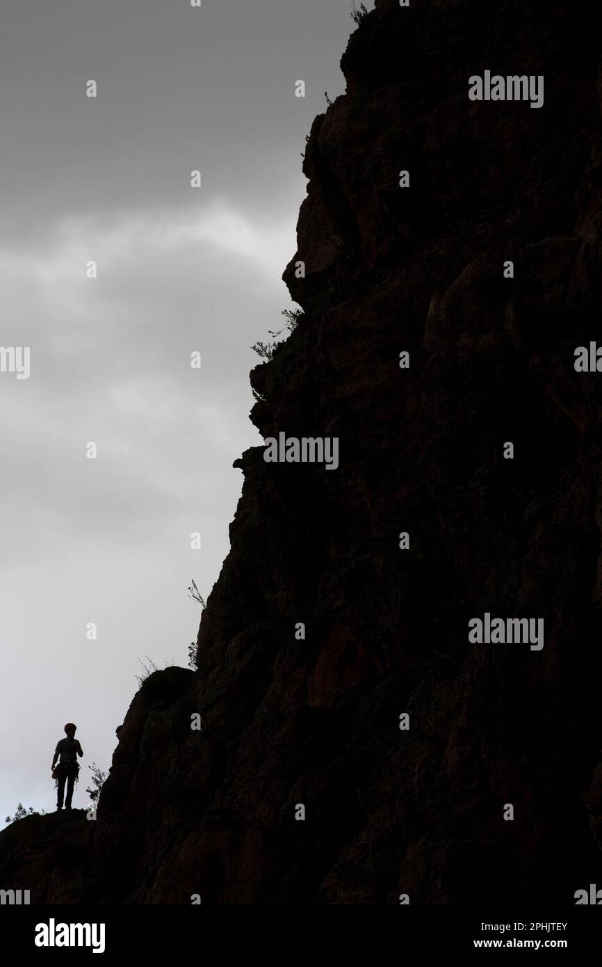 Silhouette of a climber on Mt Arapiles Stock Photo