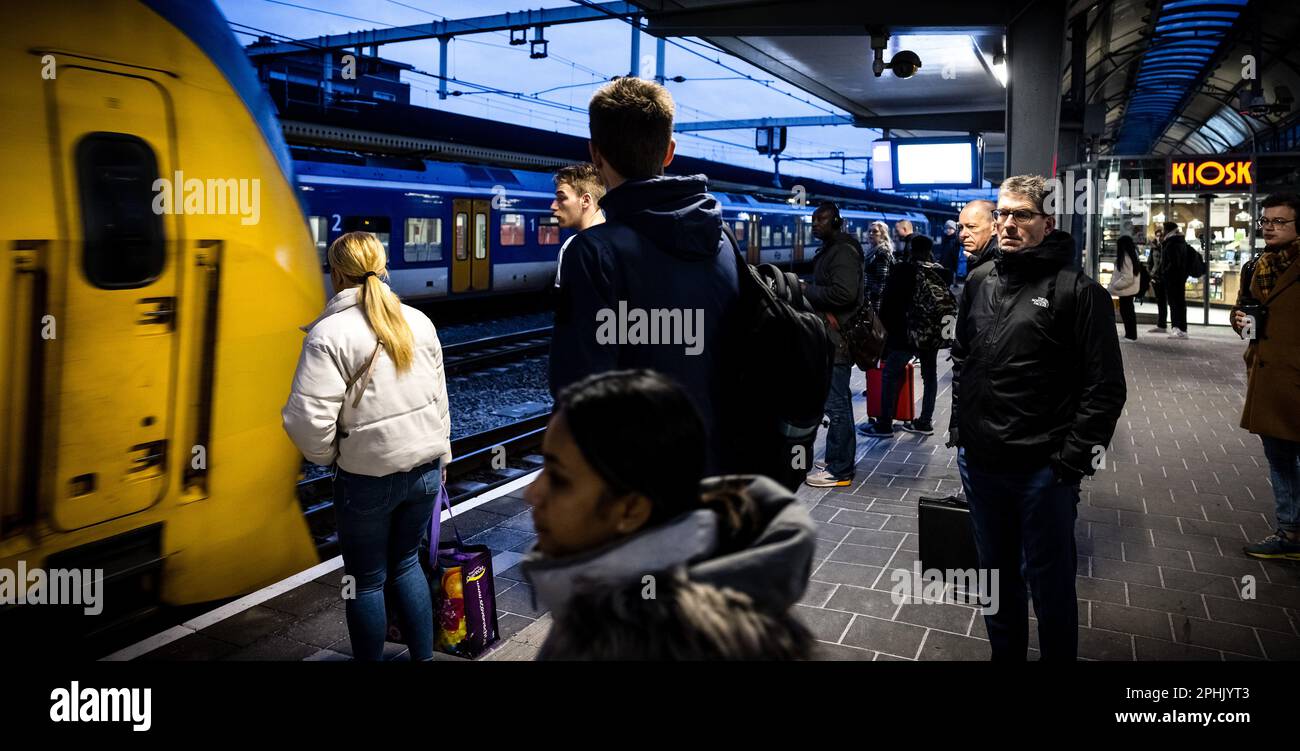 DEN BOSCH Travelers at the station board the train in the direction of Eindhoven. Train