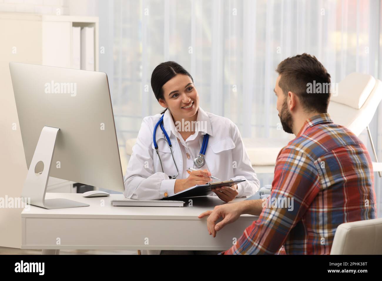 Man having appointment with neurologist in clinic Stock Photo