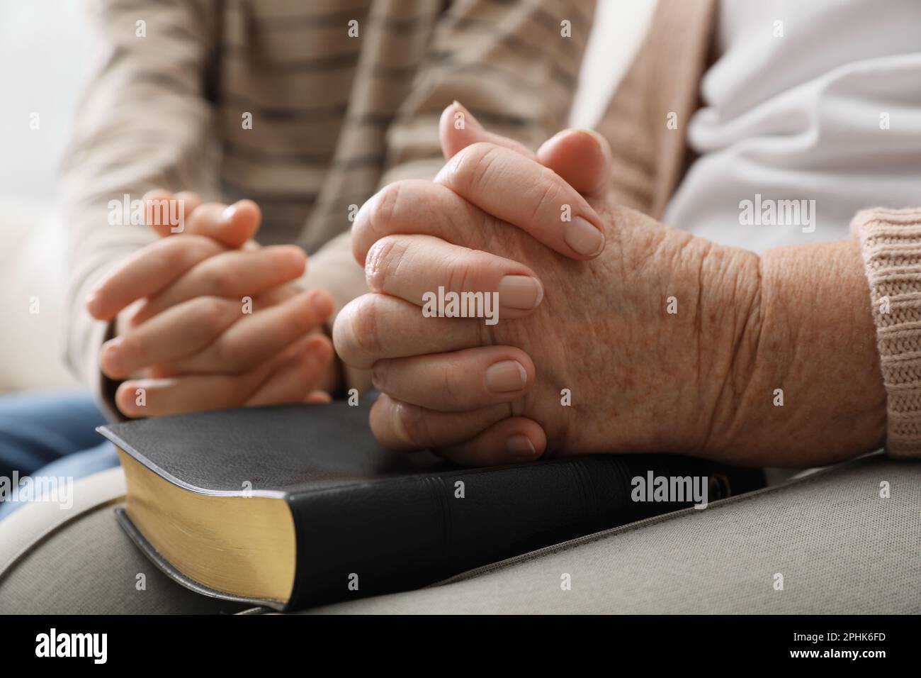 Adult child praying together hi-res stock photography and images - Alamy