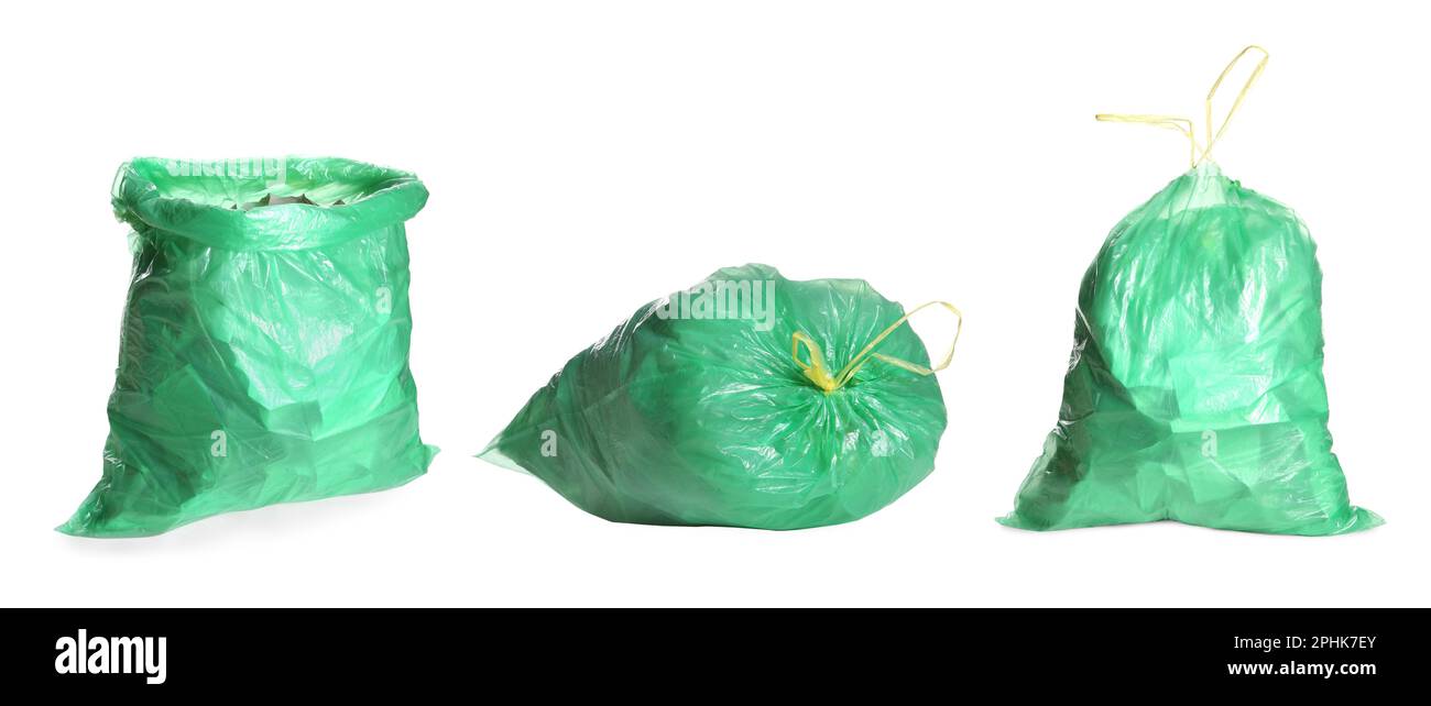 Set with green trash bags full of garbage on white background. Banner