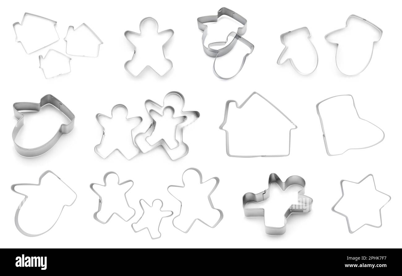 Set with cookie cutters of different shapes on white background Stock ...