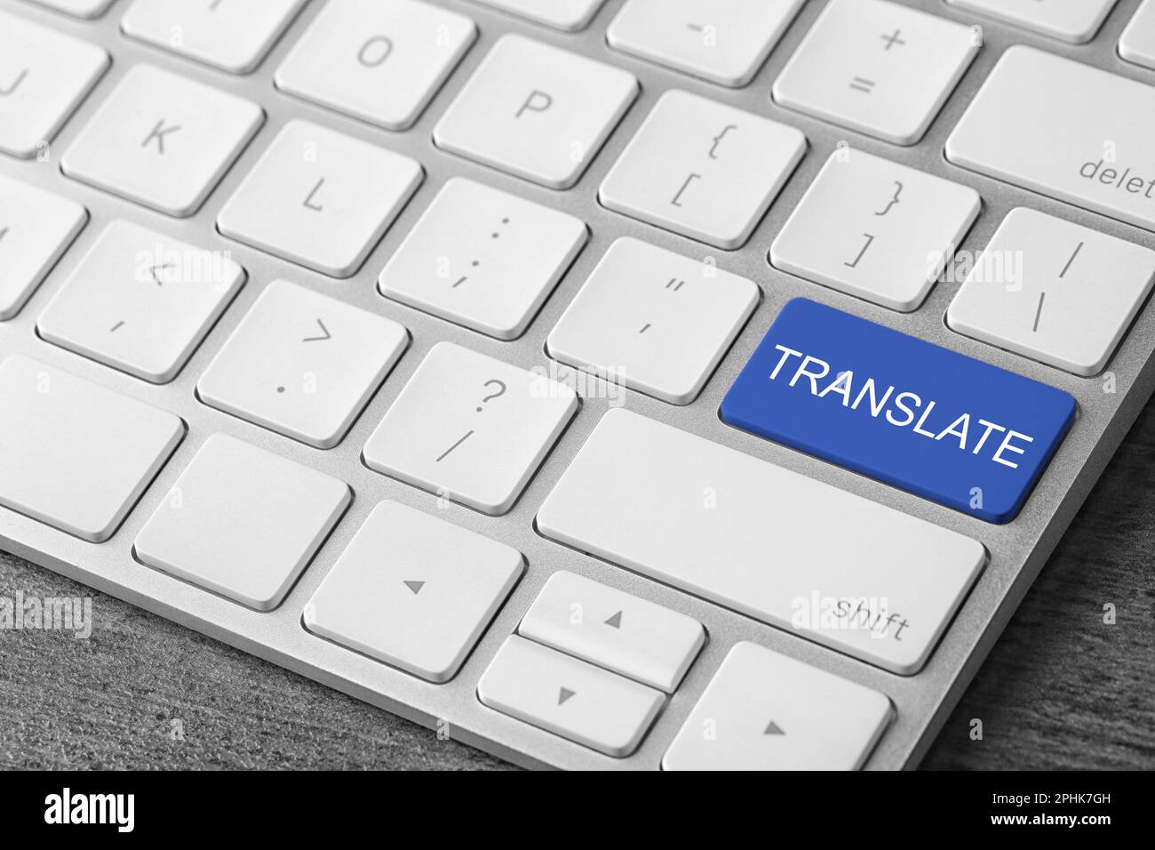 Blue button with word TRANSLATE on computer keyboard, closeup view Stock Photo