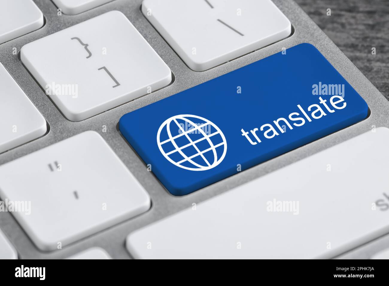 Blue button with word TRANSLATE on computer keyboard, closeup view Stock Photo