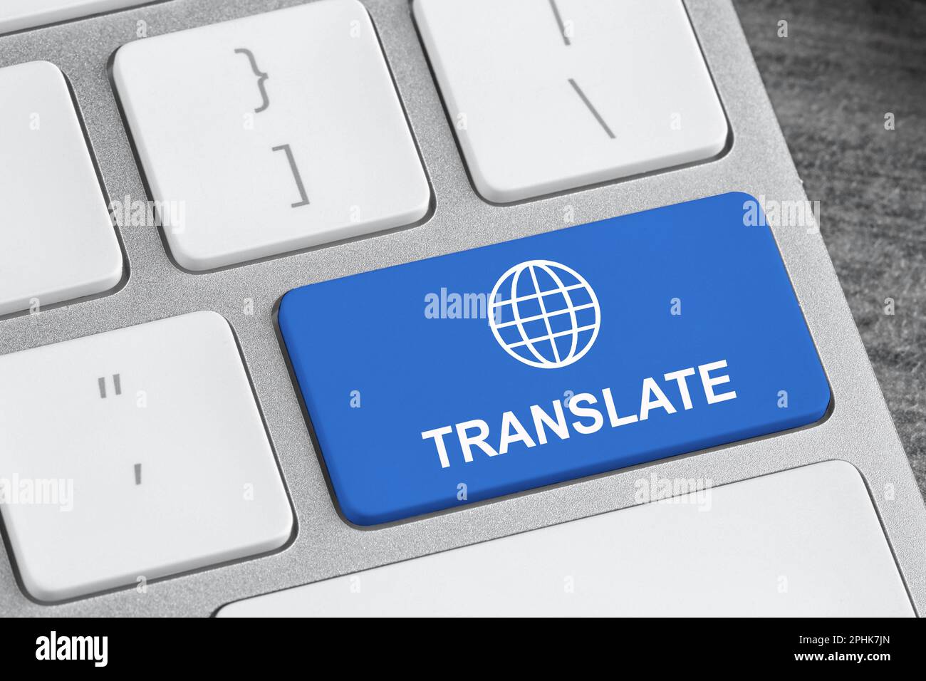 Blue button with word TRANSLATE on computer keyboard, closeup view Stock Photo