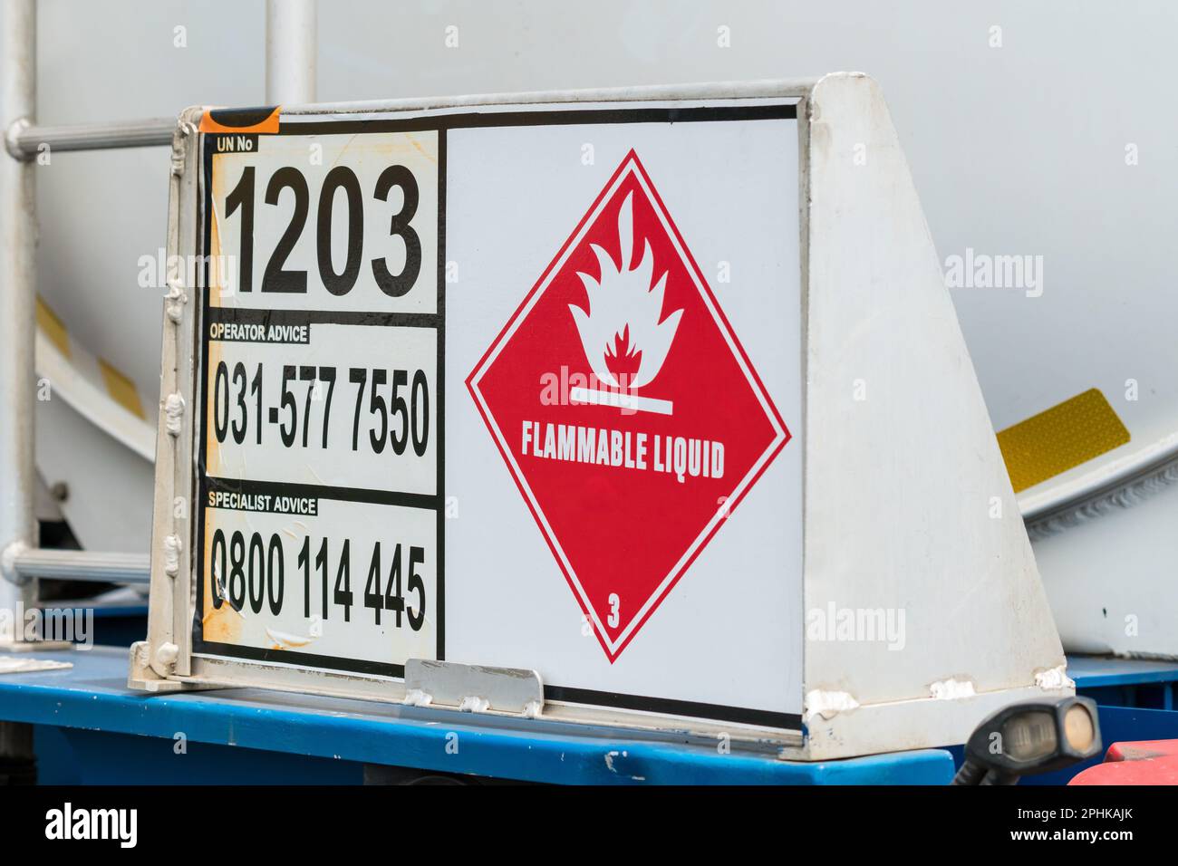 flammable liquid 3 sign or signage closeup on a vehicle which is transporting dangerous substance concept industry in South Africa Stock Photo