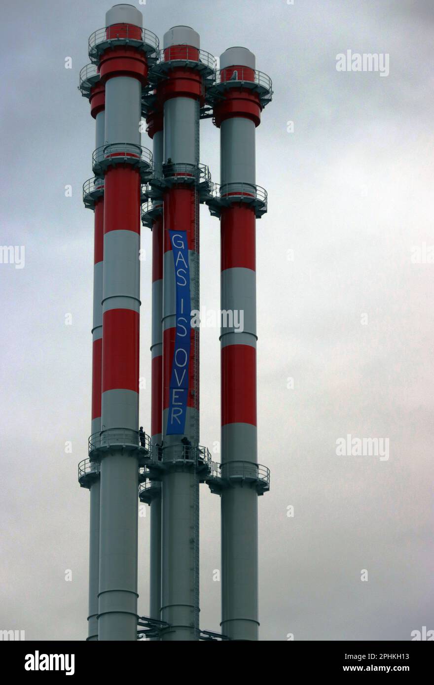 Jena, Germany. 29th Mar, 2023. Climate activists climb the chimneys of