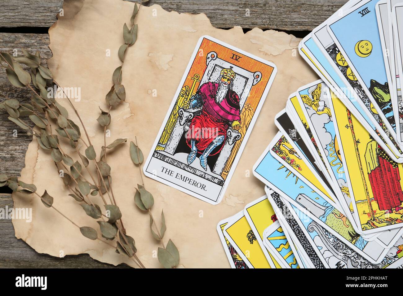 Flat lay composition with Emperor and other tarot cards on wooden table Stock Photo