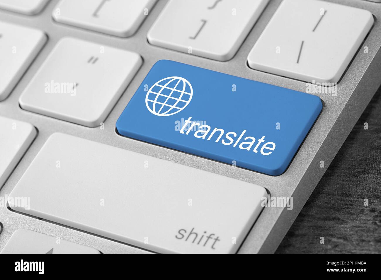 Blue button with word TRANSLATE on computer keyboard, closeup view Stock Photo