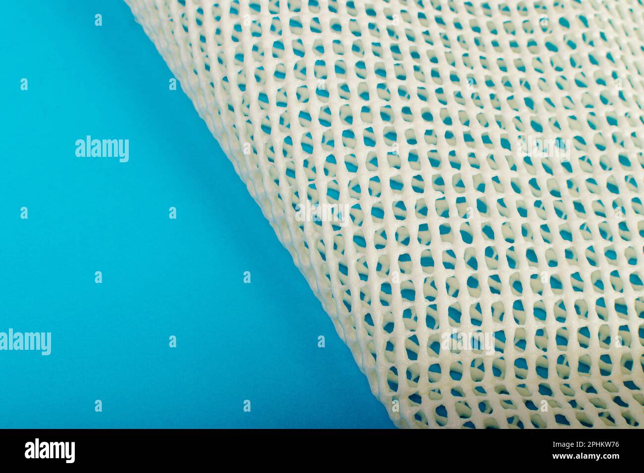 AntiSlip Underlay to Prevent Rugs from Moving, Rubber Mesh for Placing Under Carpet on Blue