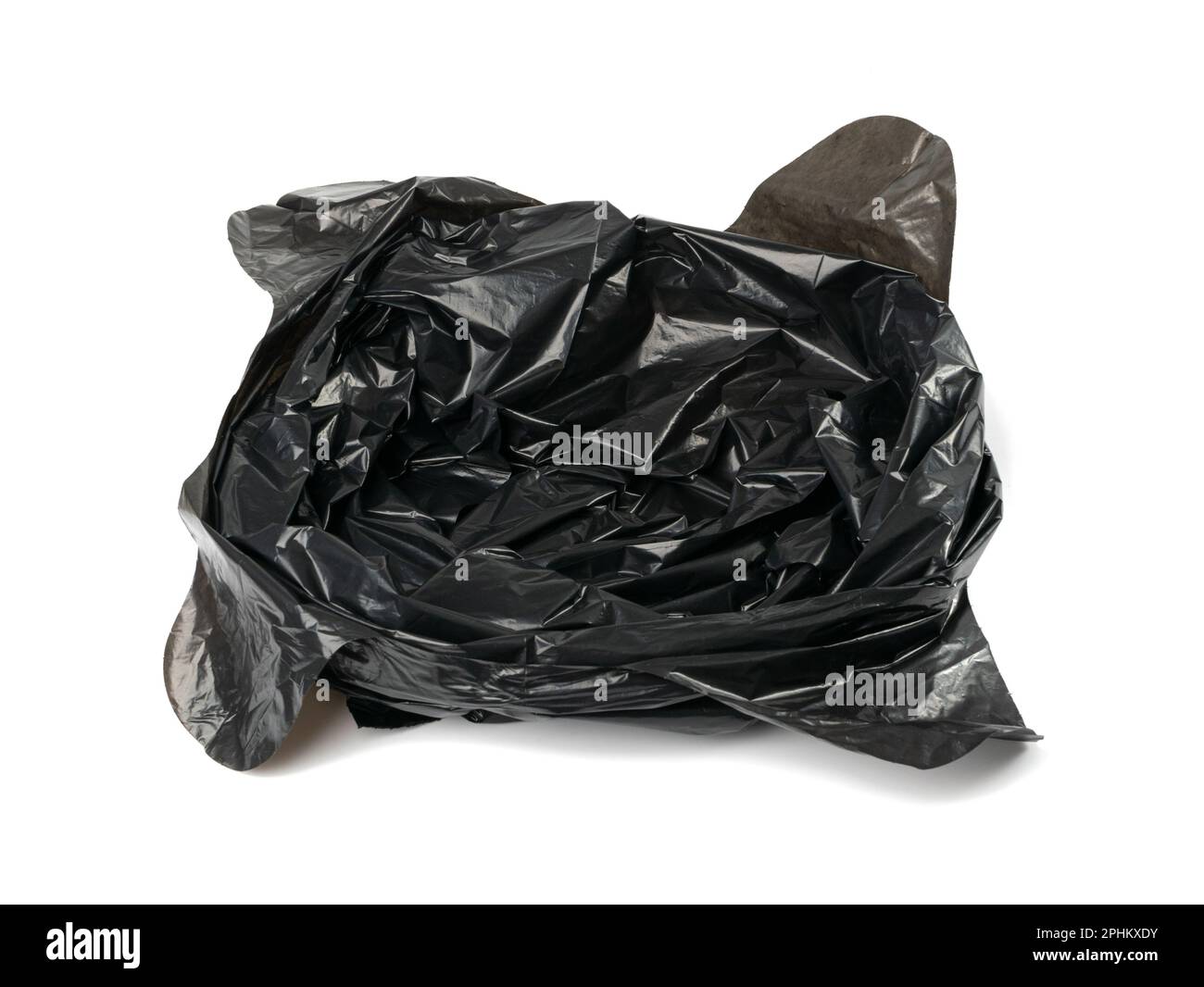 Crumpled Garbage Bag Isolated. Wrinkled Trash Package, Used Plastic Bin Bags, Black Polyethylene Waste Container on White Background Stock Photo