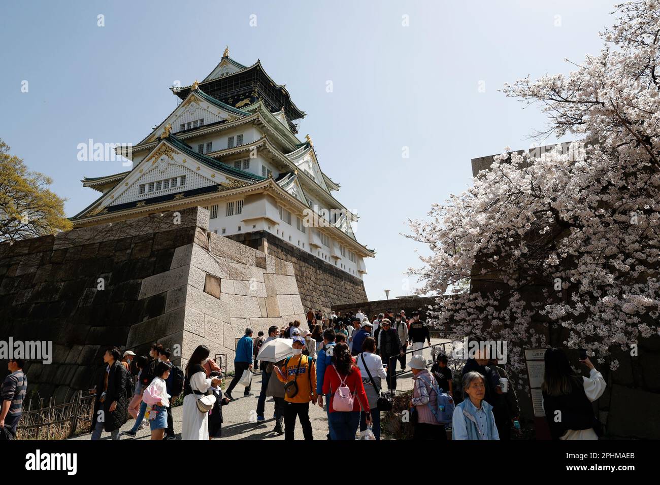 Osaka, Japan. March 28, 2023, People gather at Osaka Castle Park's