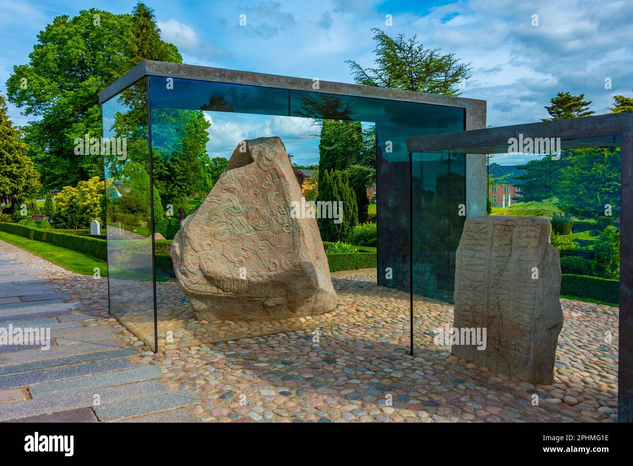 Runestone in Jelling viking site in Denmark Stock Photo - Alamy