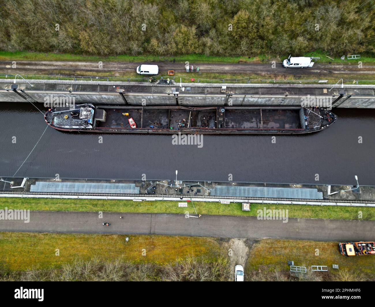 29 March 2023, Bavaria, Wörth An Der Donau A wrecked ship lies in the