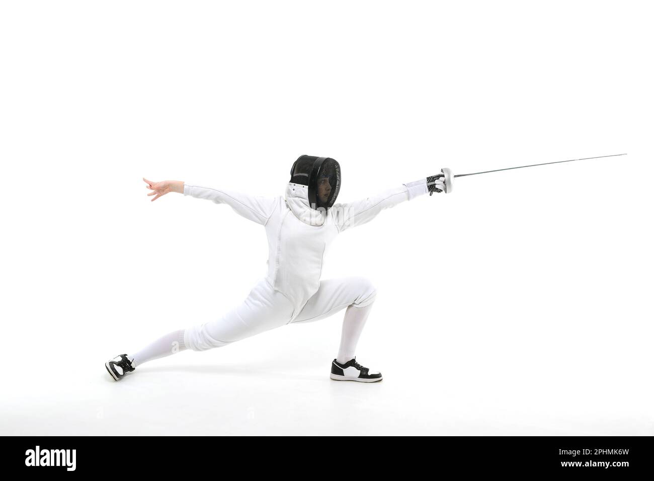 Woman in a fencing costume with a sword in hand isolated on white