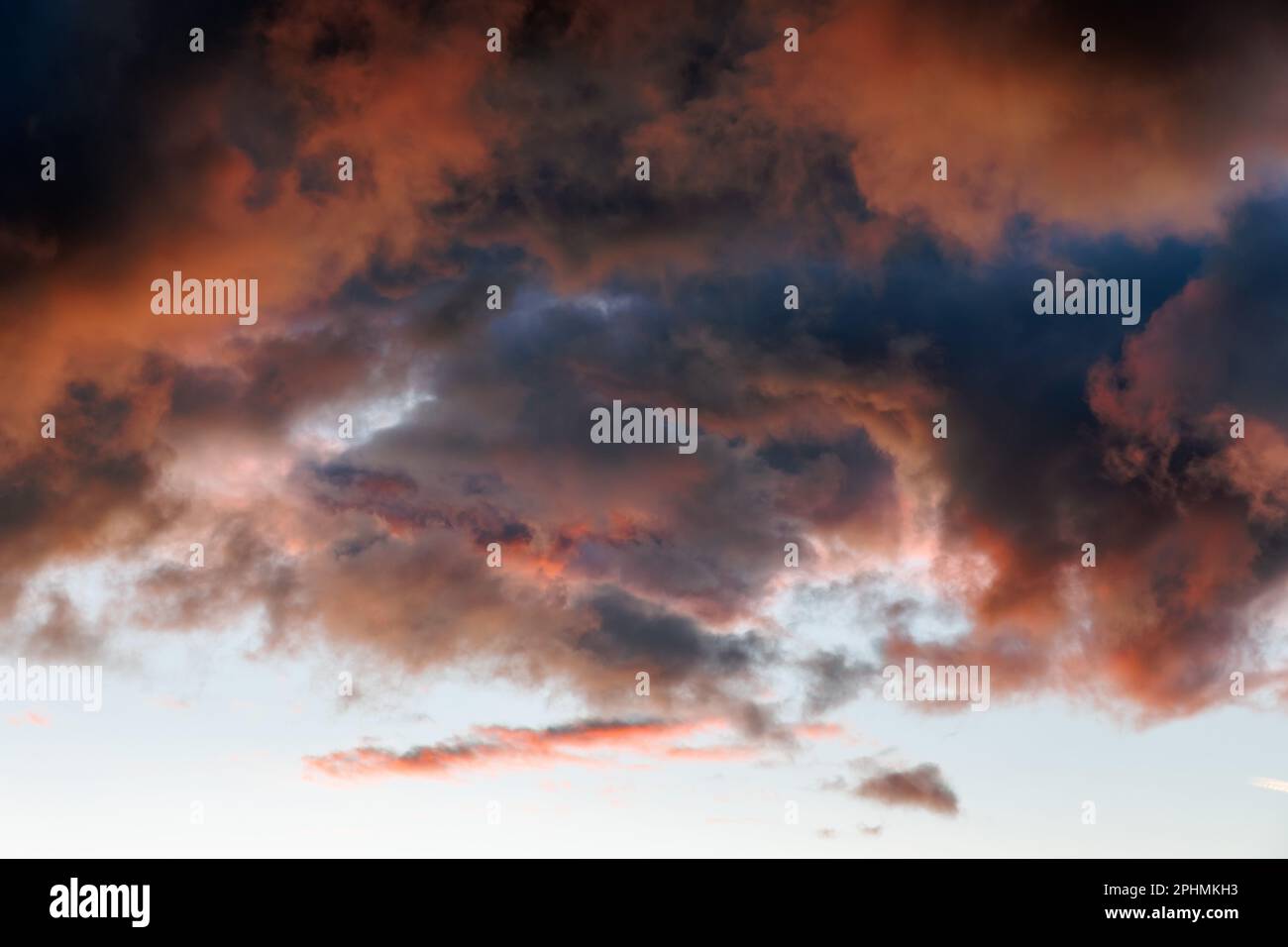Fiery sunset clouds over Glasgow. Stock Photo
