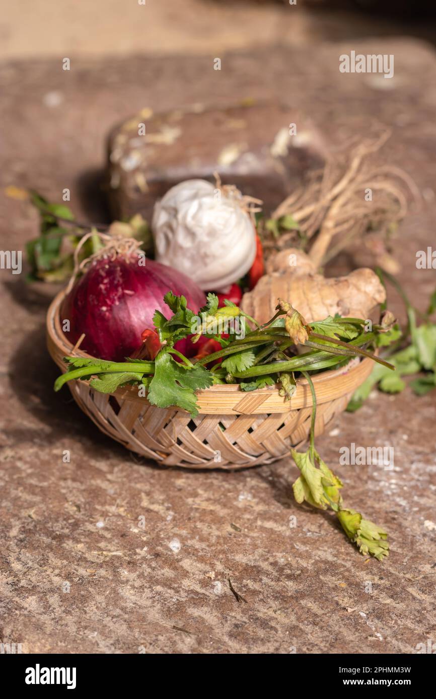 fresh mix vegetables from farm in bamboo bowl from top angle at day Stock Photo