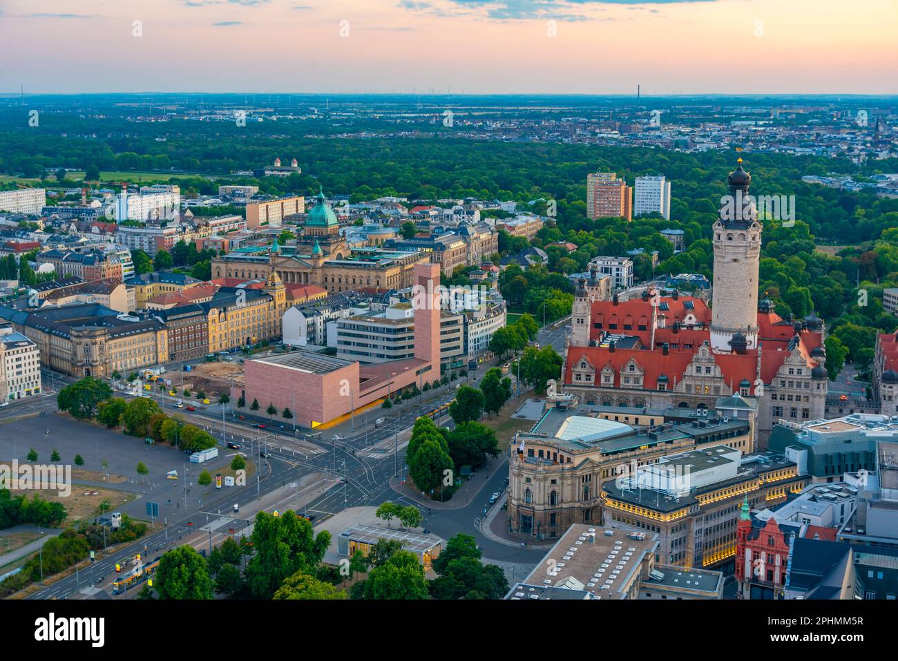 Sunset panorama view of the new town hall and its neighborhood in ...