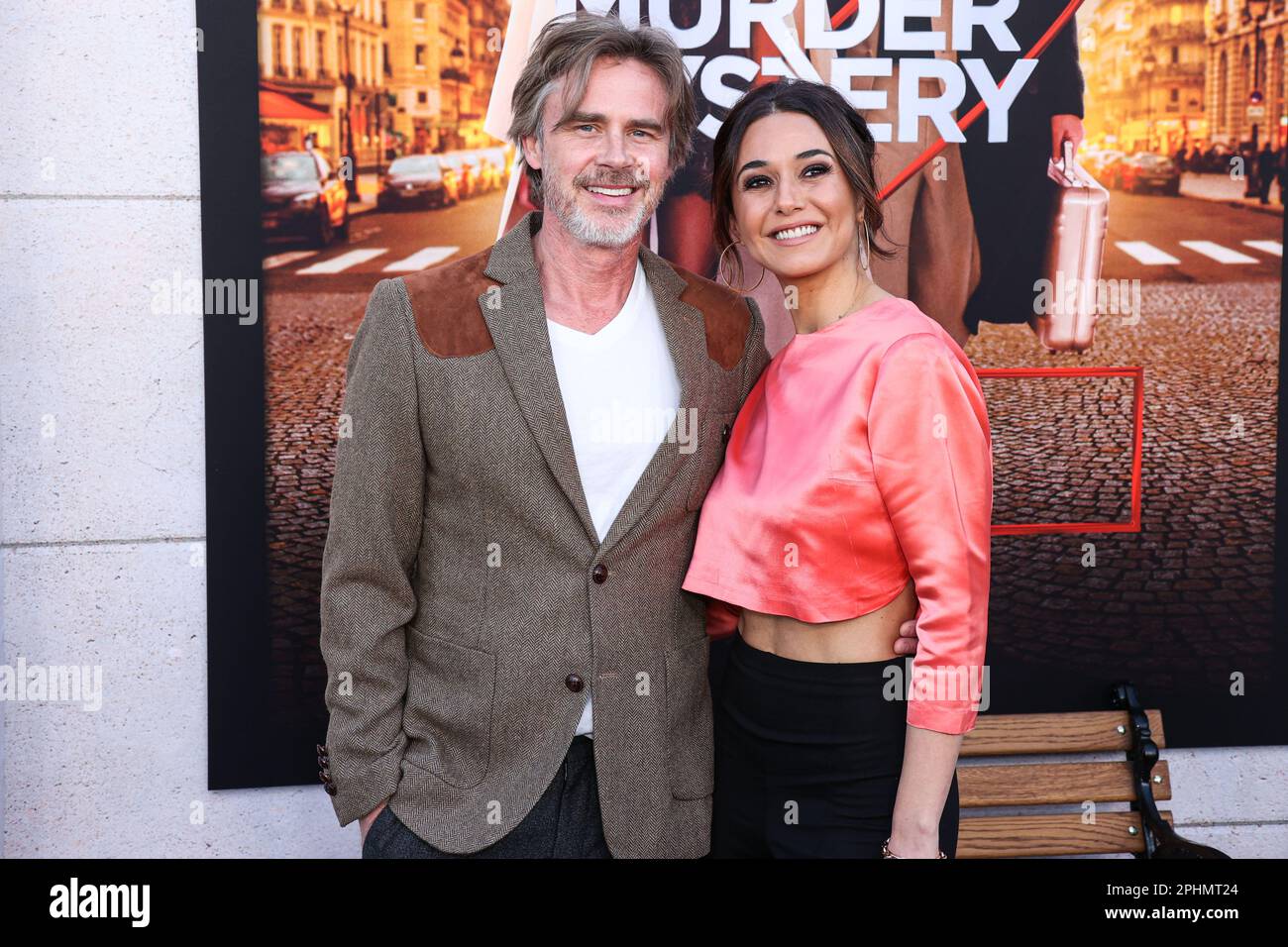 Westwood, United States. 28th Mar, 2023. WESTWOOD, LOS ANGELES, CALIFORNIA, USA - MARCH 28: Sam Trammell and girlfriend Emmanuelle Chriqui arrive at the Los Angeles Premiere Of Netflix's 'Murder Mystery 2' held at the Regency Village Theatre on March 28, 2023 in Westwood, Los Angeles, California, United States. (Photo by Xavier Collin/Image Press Agency) Credit: Image Press Agency/Alamy Live News Stock Photo