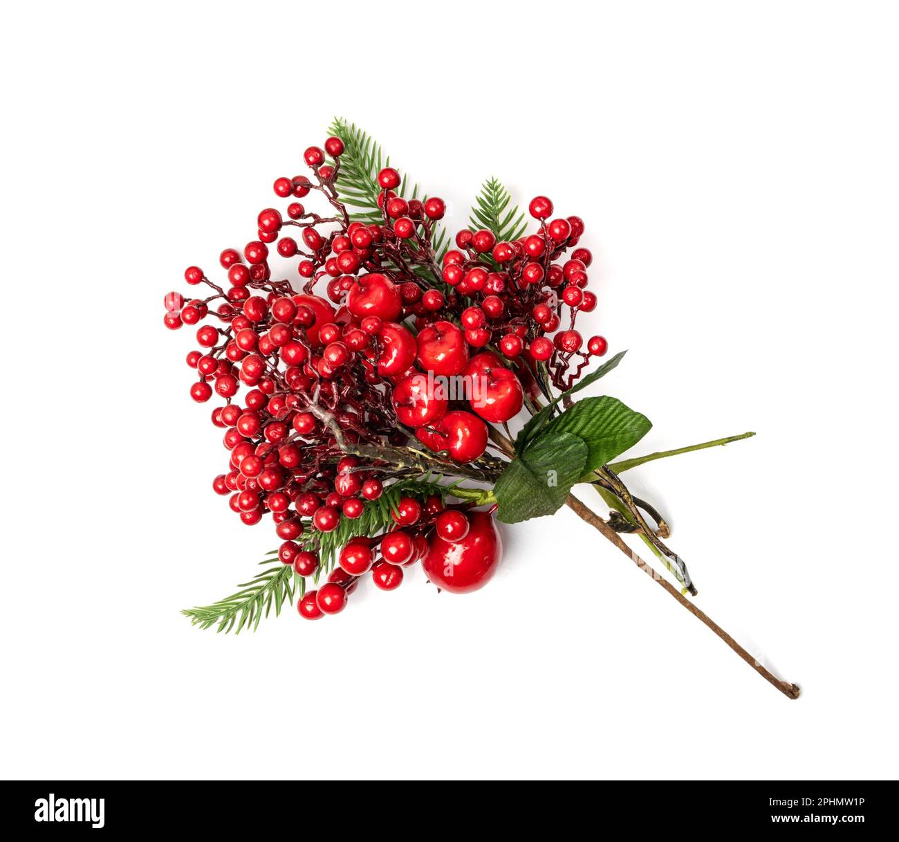 Christmas branch with red berries. Artificial home decoration plant, rowan, ashberry or kalina twig isolated on white background Stock Photo