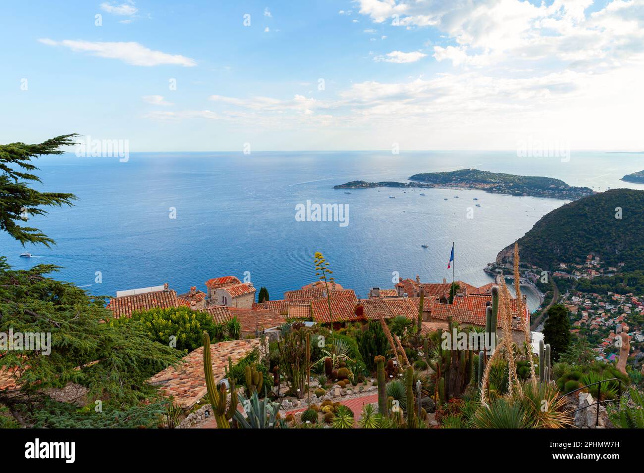 Eze village on a summer day. Coastal landscape photo with red tile roofs and Mediterranean sea. Alpes-Maritimes, France Stock Photo