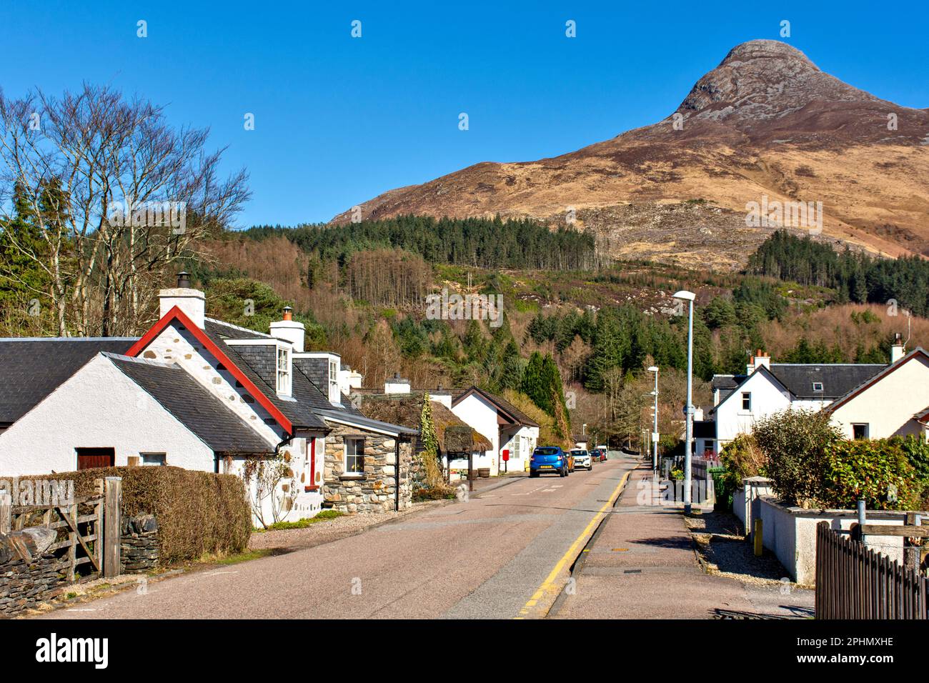 Glencoe village view of houses in Gleann Comhann street and looking