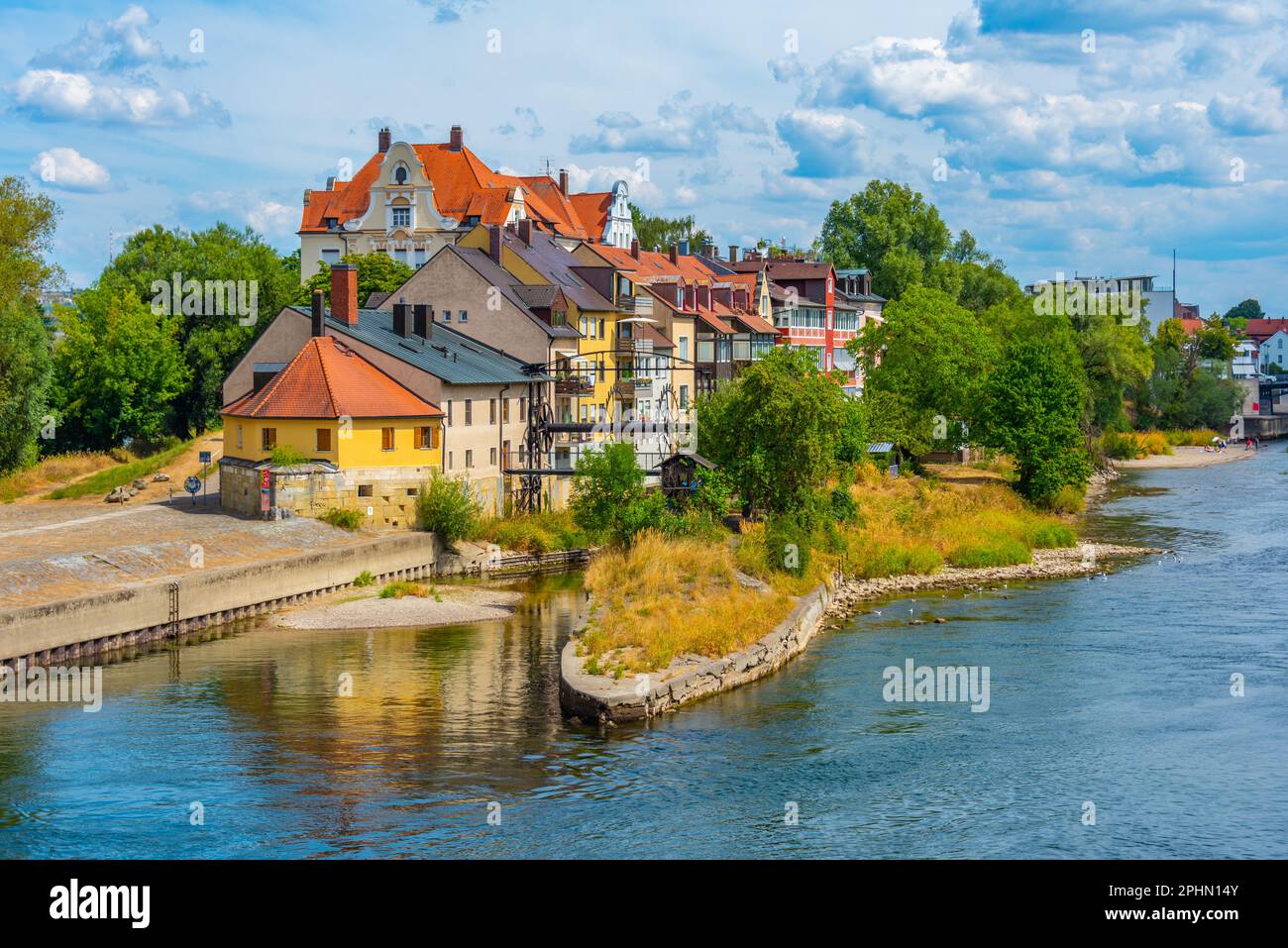 Colorful houses at waterfront of Danube river in Regensburg, Germany