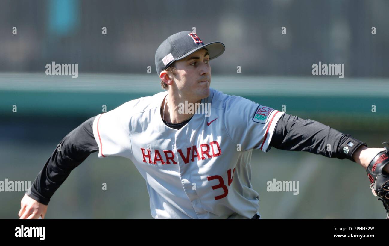 Harvard pitcher Chris Clark throws against Penn during an NCAA baseball