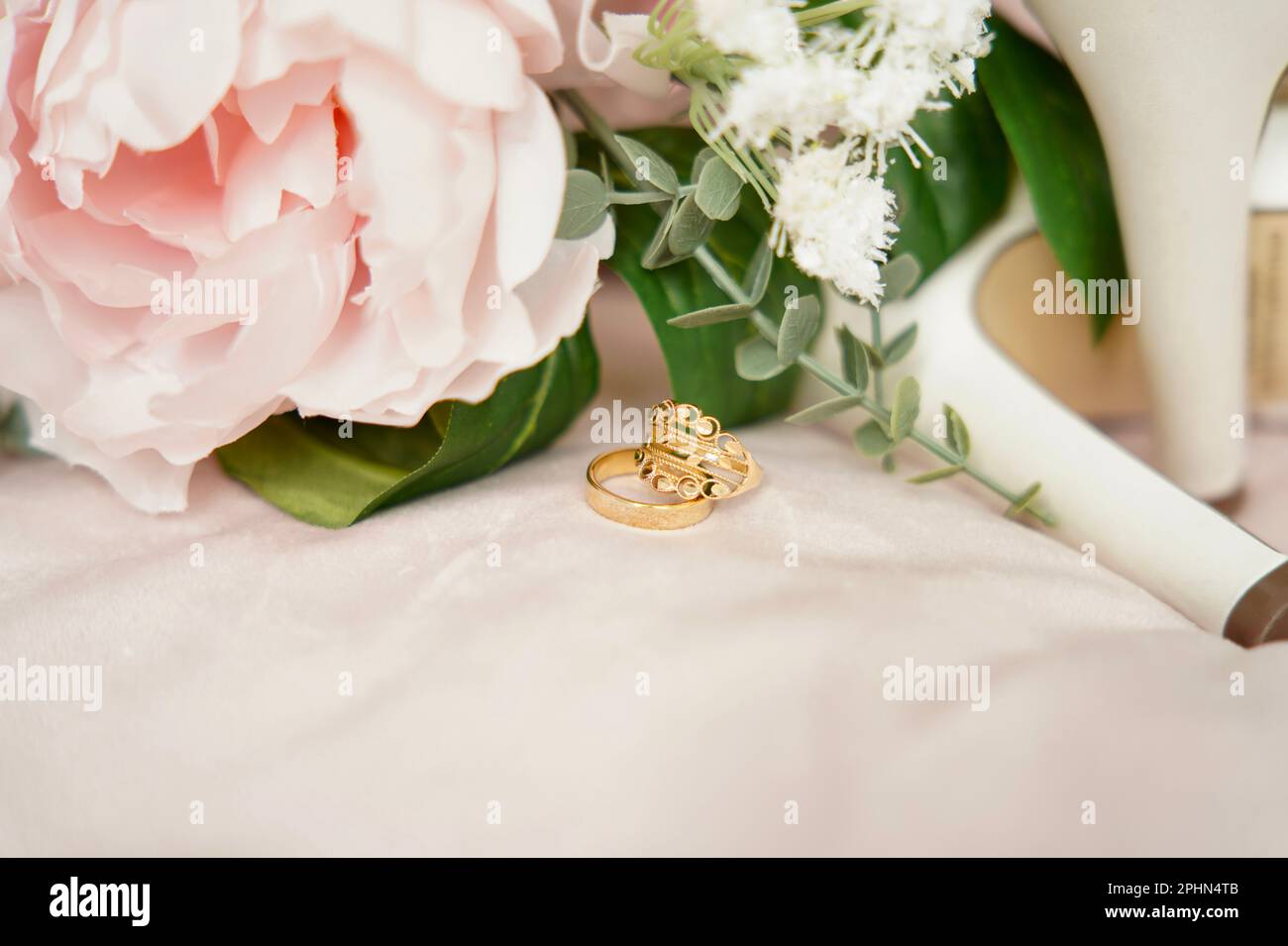 Luxury gold wedding ring, selective focus Stock Photo