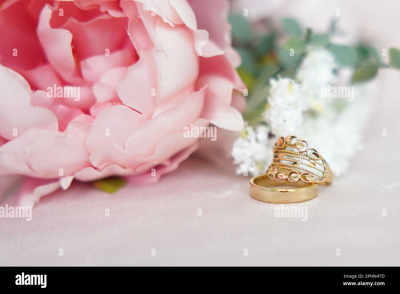 Luxury gold wedding ring, selective focus Stock Photo