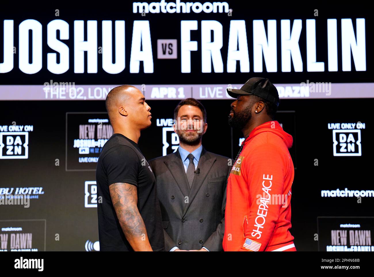 Boxing promoter Eddie Hearn stands in the centre as Fabio Wardley (left) and Michael Polite Coffie face off during a press conference at Nobu Hotel London Portman Square, London. Picture date: Wednesday March 29, 2023. Stock Photo