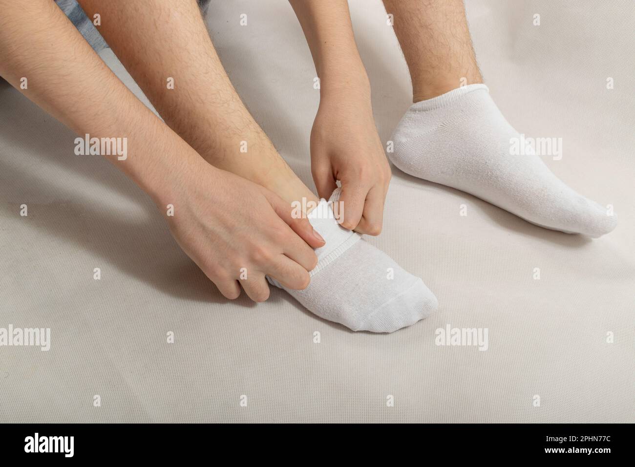 Sock feet hi-res stock photography and images - Alamy