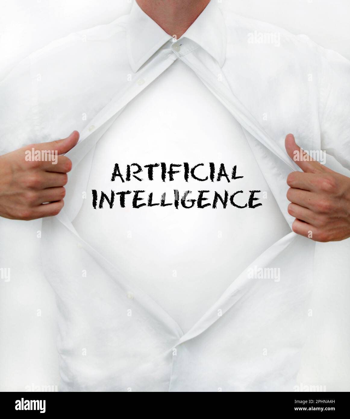 Man opens his shirt to reveal AI - Artificial Intelligence - written on it Stock Photo
