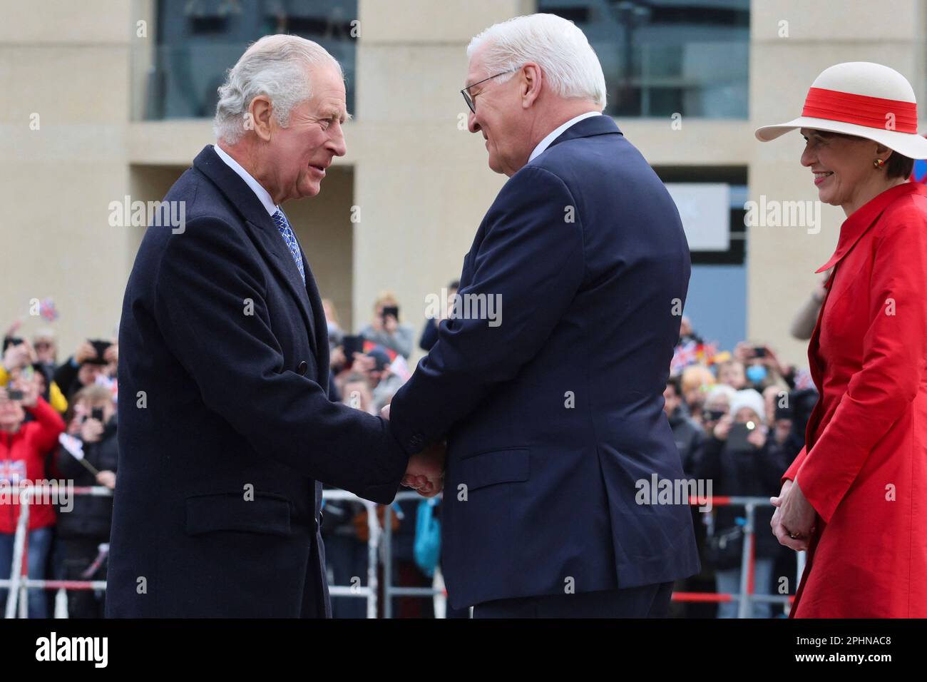 German President Frank-Walter Steinmeier shakes hands with Britain's ...