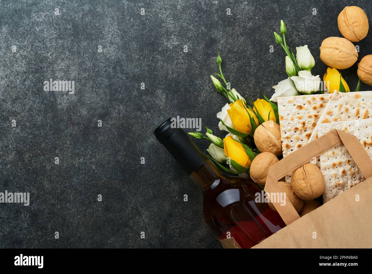 Passover Pesah celebration concept. Matzah, kosher red wine, walnut and