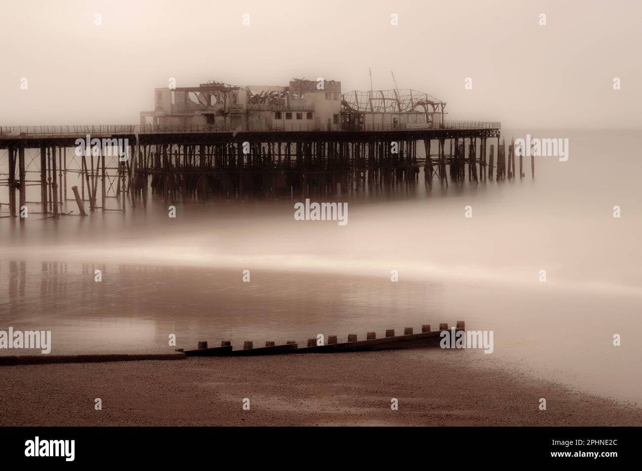 The end of a rock and roll dream … the twisted ruins of Hastings Pier in East Sussex, England, UK, once a major music venue hosting Pink Floyd, Jimi Hendrix and the Rolling Stones, pictured in May 2011 seven months after a devastating fire.  The 1870s structure has since been redeveloped and reopened to visitors. Stock Photo