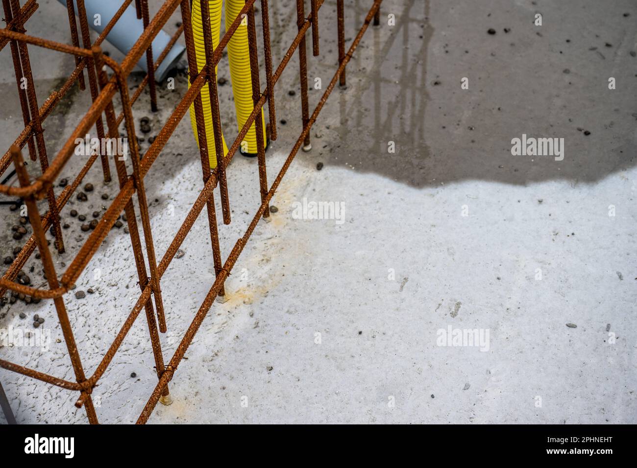 Rebar in concrete at a construction site Stock Photo Alamy