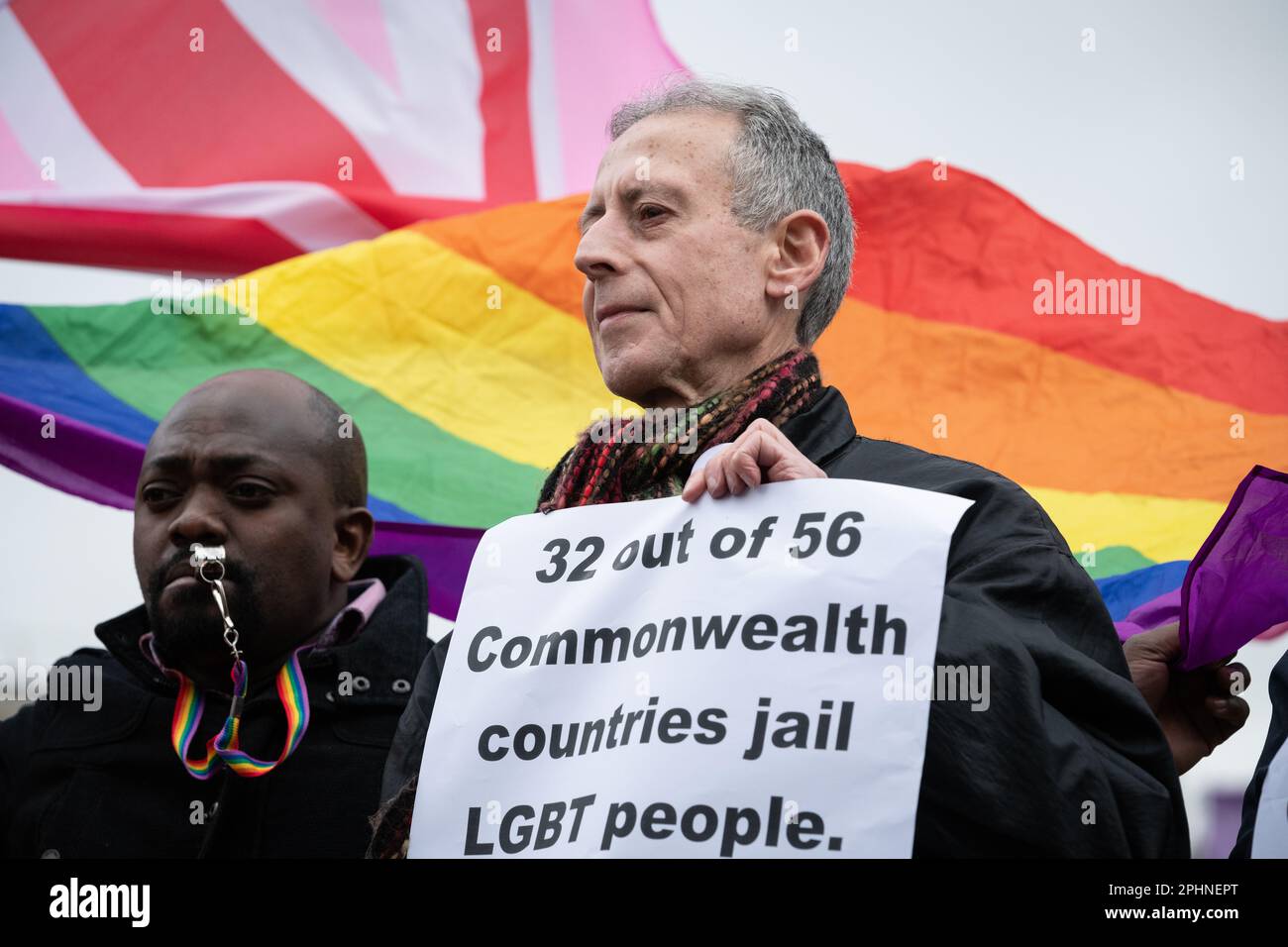 London, UK. 13 March, 2023. Activist Peter Tatchell addresses an LGTB+ rights demo outside Westminster Abbey during the Commonwealth Day Service. Stock Photo