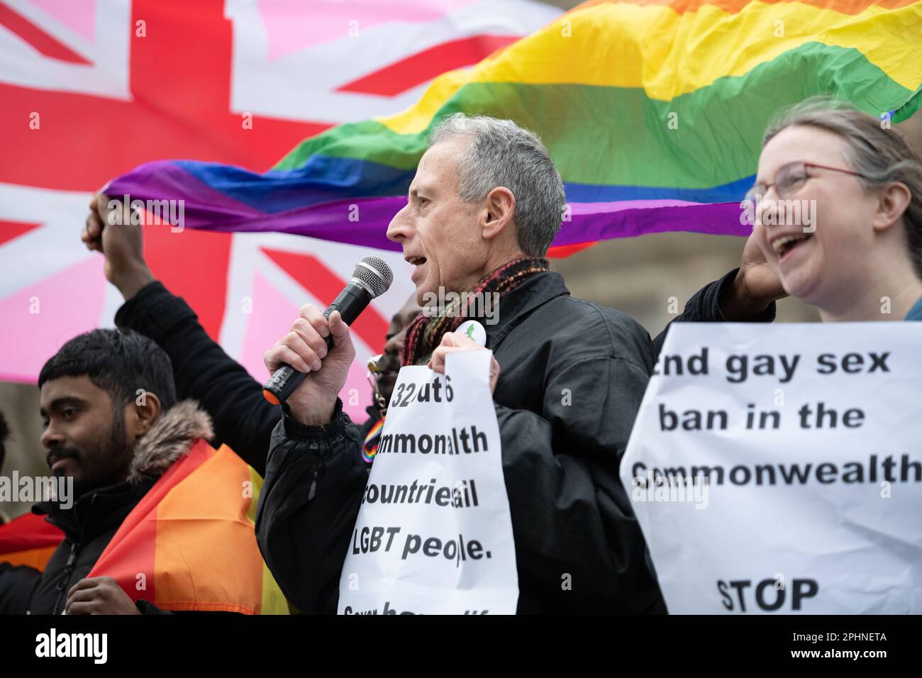 London, UK. 13 March, 2023. Activist Peter Tatchell addresses an LGTB+ rights demo outside Westminster Abbey during the Commonwealth Day Service. Stock Photo