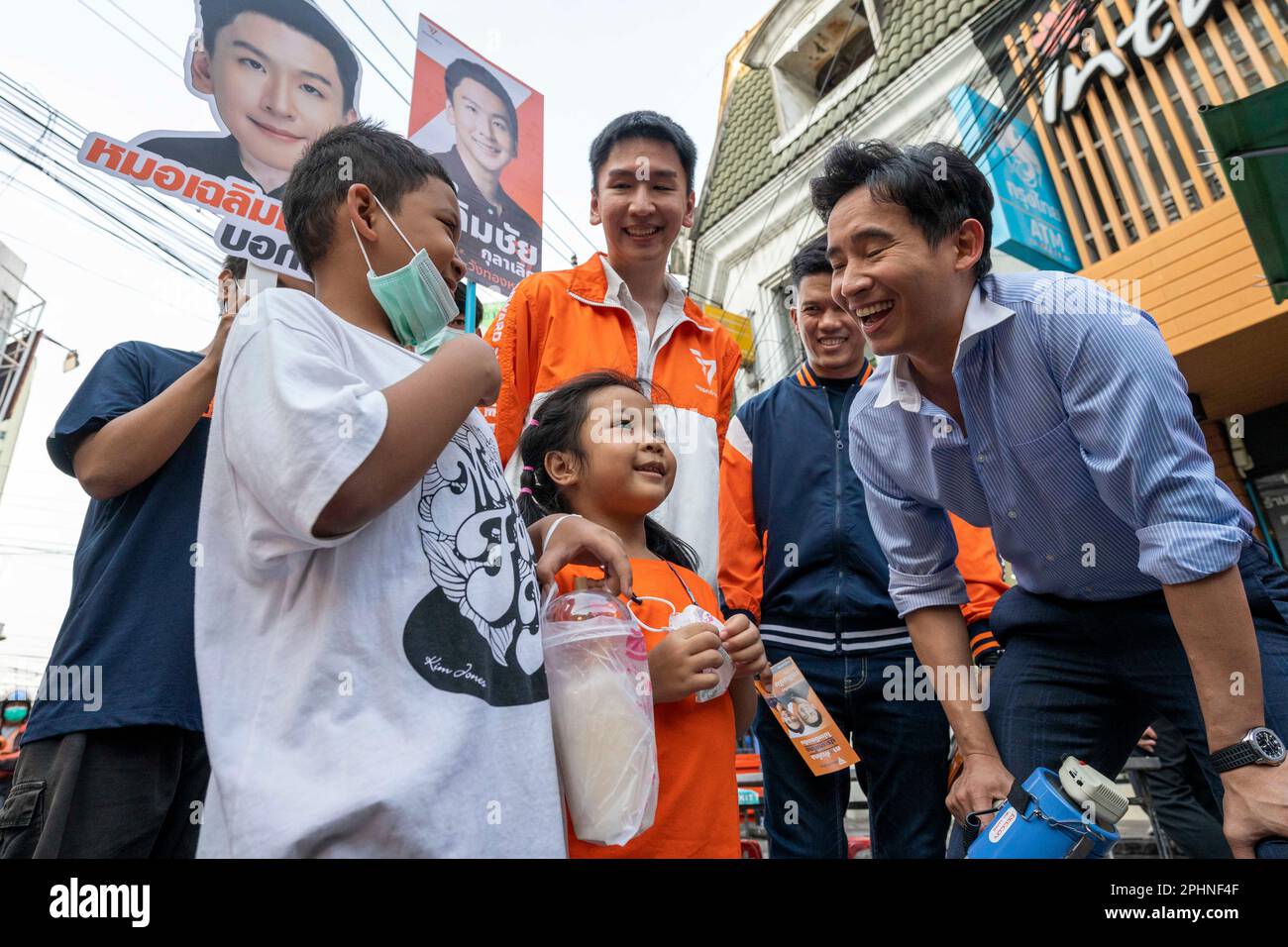 Bangkok, Bangkok, Thailand. 29th Mar, 2023. Move Forward party leader Pita Limjaroenrat (right) and local representative candidate Chalermchai Kulalert (center) canvass for votes in a market in the Lat Prao district of the Thai capital Bangkok. Thailand's upcoming elections scheduled for May 14th, 2023 will be the nation's first general election since 2019. (Credit Image: © Adryel Talamantes/ZUMA Press Wire) EDITORIAL USAGE ONLY! Not for Commercial USAGE! Stock Photo